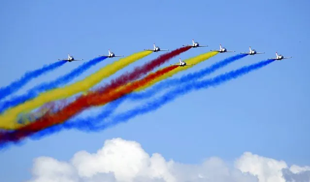 Hongying aerobatic team from the Aviation University of Air Force performs during an aerobatic display on the Chinese Air Force open day at an airport in Changchun, Jilin province, China, September 12, 2015. (Photo by Reuters/China Daily)