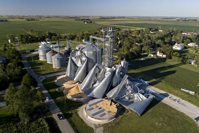 In this aerial image from a drone, damaged grain bins are shown at the Heartland Co-Op grain elevator on August 11, 2020 in Luther, Iowa. Iowa Gov. Kim Reynolds said early estimates indicate 10 million acres, nearly a 1/3 of the states land used for crops, were damaged when a powerful storm battered the region a day earlier. (Photo by Daniel Acker/Getty Images)
