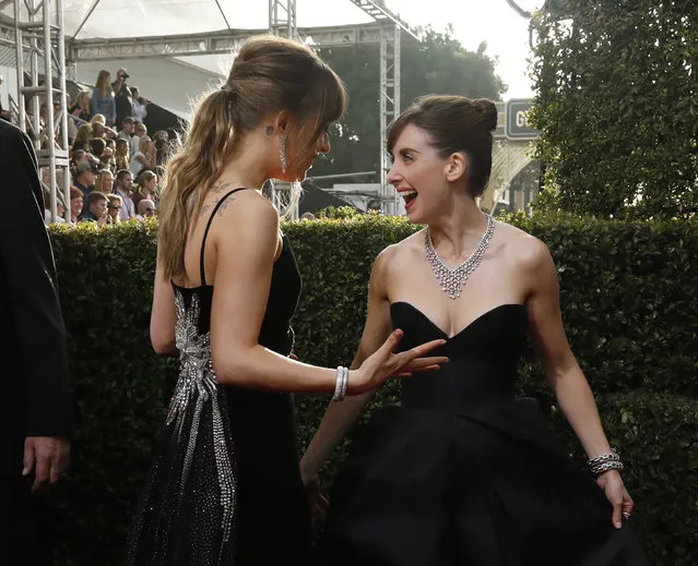 Mandy Moore and Alison Brie attend The 75th Annual Golden Globe Awards at The Beverly Hilton Hotel on January 7, 2018 in Beverly Hills, California. (Photo by Mario Anzuoni/Reuters)