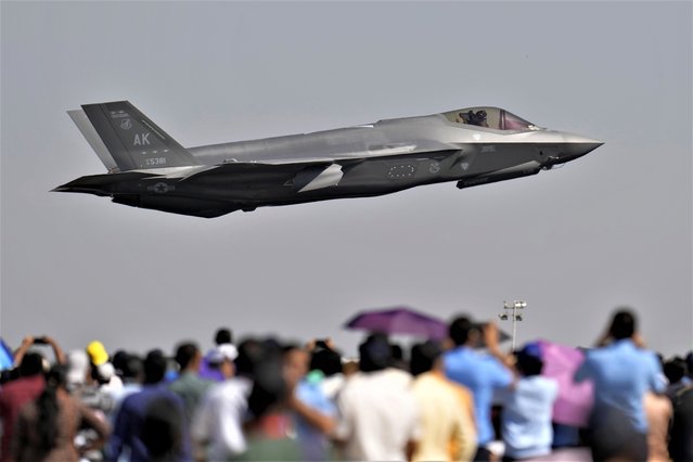 U.S. Air Force fighter aircraft F-35 takes off on the fourth day of the Aero India 2023 at Yelahanka air base in Bengaluru, India, Thursday, February 16, 2023. Aero India is a biennial event with flying demonstrations by stunt teams and militaries and commercial pavilions where aviation companies display their products and technology. (Photo by Aijaz Rahi/AP Photo)