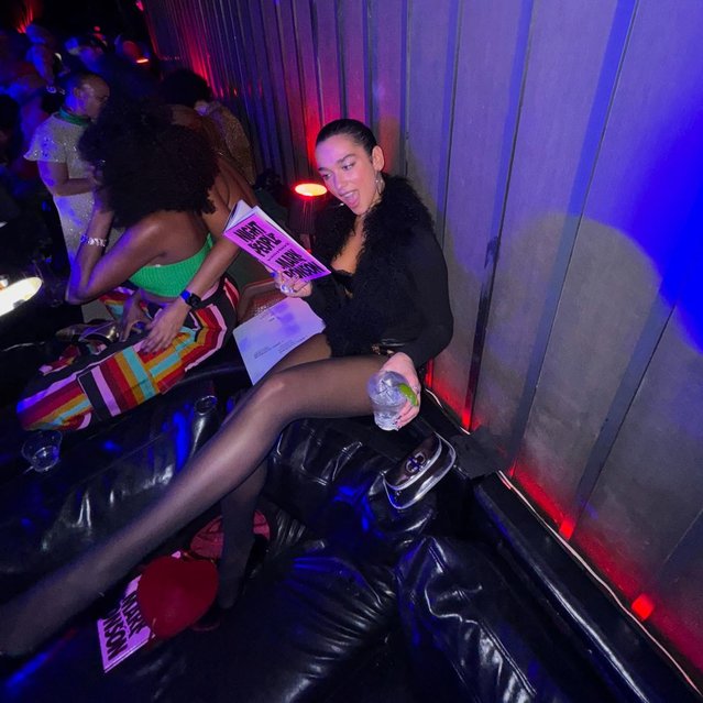 English singer Dua Lipa reads a book at the club on September 21, 2025 in NYC. (Photo by dualipa/Instagram)