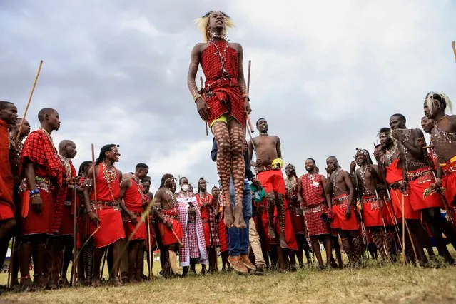 Maasai morans (warriors) perform traditional jumping as Kenya's Maasai community held an inaugural Maasai Cultural Festival, on the outskirts of Maasai Mara National Reserve, Kenya's Rift Valley on Saturday, June 10, 2023. (Photo by AP Photo)