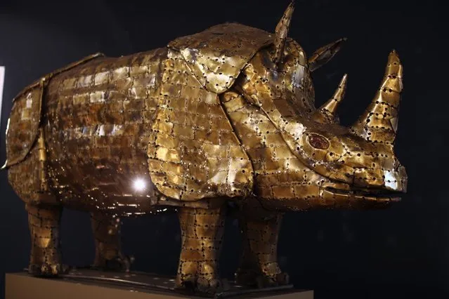 A brass sculpture of a Rhinoceros sits at Christie's Auction House on August 5, 2013 in London, England. The piece makes up part of the “Out of the Ordinary” sale at Christie's Auction House, and is expected to fetch between £8,000 – £10,000 GBP when it goes on sale on September 5, 2013. (Photo by Dan Kitwood/Getty Images)