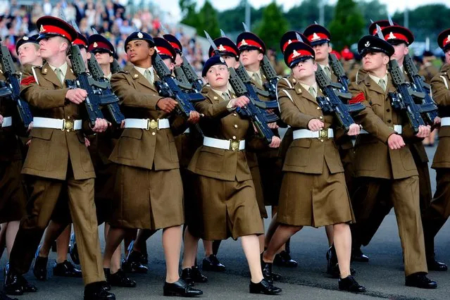 Junior soldiers graduate at the Army Foundation College, Harrogate, on August 16, 2013. The largest military graduation parade in Europe took place yesterday in Harrogate where nearly 700 junior soldiers from Cambrai, Peninsula and Burma companies marched onto the parade ground. (Photo by Anna Gowthorpe/PA Wire)