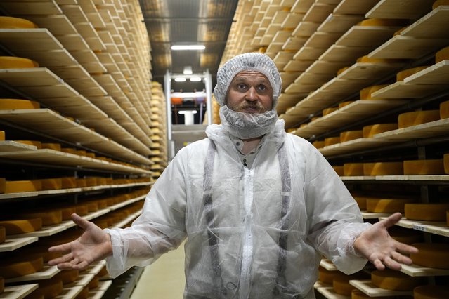 Russian cheese maker Oleg Sirota gestures during his interview with the Associated Press in Dubrovskoye village, in Istra district, 51 km. (31,8 miles) west of Moscow, Russia, Thursday, July 15, 2021. Thursday is the deadline the authorities set for eligible companies to ensure that 60% of their staff receive at least one shot of a vaccine. Sirota, founder of a cheese factory that has dozens of retail outlets in and around the Russian capital, said that as of Thursday, 70% of staff have received their shots, but the reluctance was difficult to overcome. (Photo by Alexander Zemlianichenko/AP Photo)