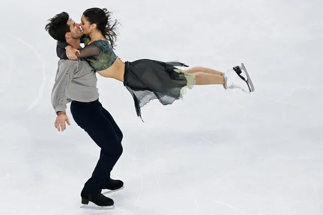 Canada's Laurence Fournier Beaudry and Nikolaj Soerensen perform in the Ice Dance event at the ISU 2023 figure skating Grand Prix de France in Angers, western France, on November 4, 2023. (Photo by Sebastien Salom-Gomis/AFP Photo)