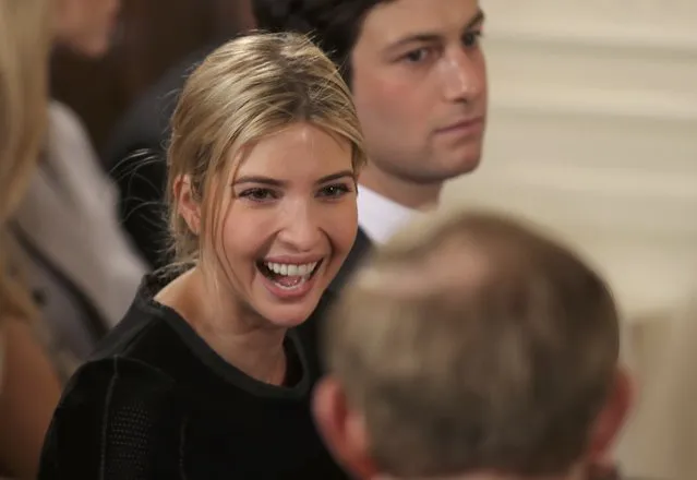 Ivanka Trump speaks with a guest before a swearing-in ceremony for senior staff at the White House in Washington, DC January 22, 2017. (Photo by Carlos Barria/Reuters)