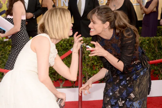 Actresses Sarah Paulson (L) and Amanda Peet attend 20th Annual Screen Actors Guild Awards at The Shrine Auditorium on January 18, 2014 in Los Angeles, California. (Photo by Theo Wargo/WireImage)