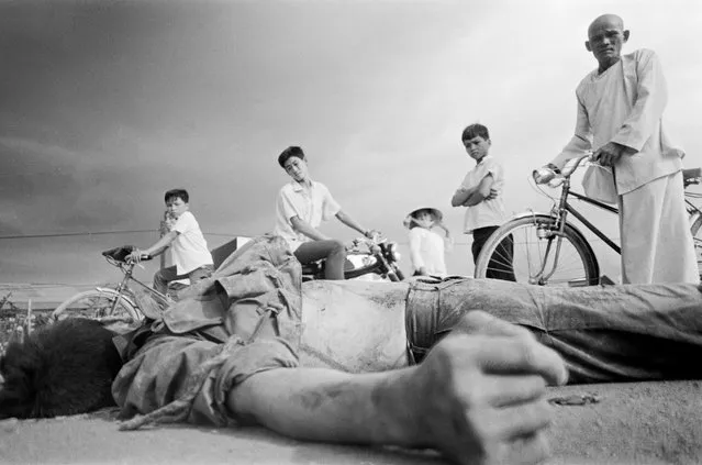 A Viet Cong soldier killed during the Tet Offensive, Cholon, Saigon, Vietnam, 1968. (Photo by Eddie Adams/The Guardian)