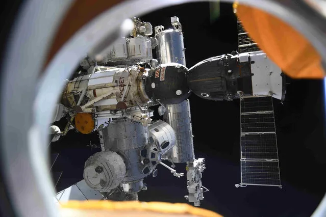 In this photo taken by Russian cosmonaut Oleg Novitsky and provided by Roscosmos Space Agency Press Service, the International Space Station is seen from the Nauka module on Wednesday, August 11, 2021. (Photo by Oleg Novitsky/Roscosmos Space Agency Press Service photo via AP Photo)