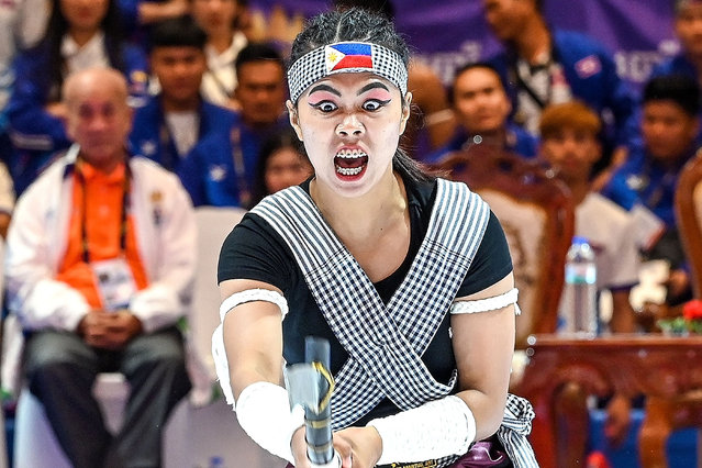 Philippines Mitz Jude Jalandoni competes in the women's Kun Bokator singles Phkak final event during the 32nd Southeast Asian Games (SEA Games) in Phnom Penh on May 8, 2023. (Photo by Tang Chhin Sothy and Tang Chhin Sothy/AFP Photo)