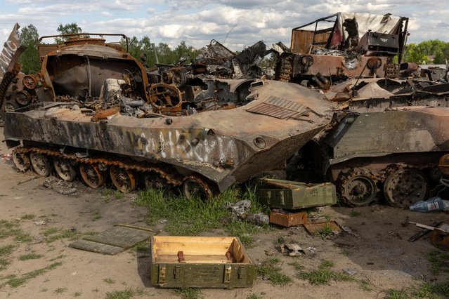 Destroyed Russian tanks and military vehicles are seen dumped in Bucha amid Russia's invasion in Ukraine on May 16, 2022. (Photo by Jorge Silva/Reuters)