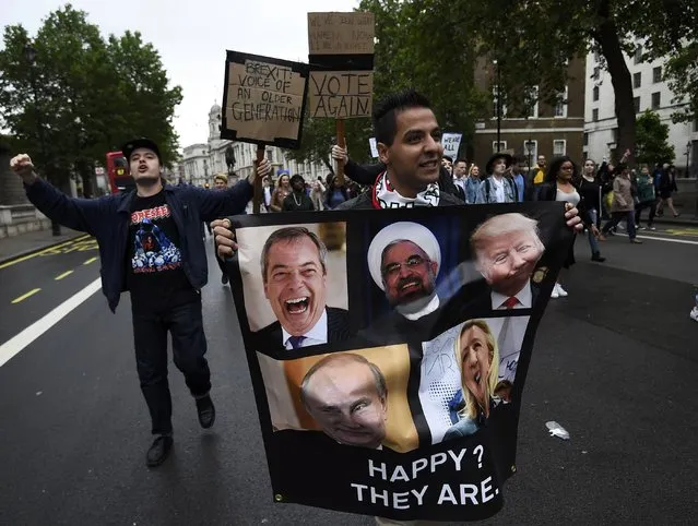 Demonstrators walk along Whitehall as they take part in a protest aimed at showing London's solidarity with the European Union following the recent EU referendum, in central London, Britain June 28, 2016. (Photo by Dylan Martinez/Reuters)