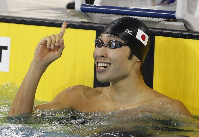 Japan's Kosuke Hagino reacts after winning in the men's 200m freestyle final swimming competition at the Munhak Park Tae-hwan Aquatics Center during the 17th Asian Games in Incheon September 21, 2014. (Photo by Tim Wimborne/Reuters)