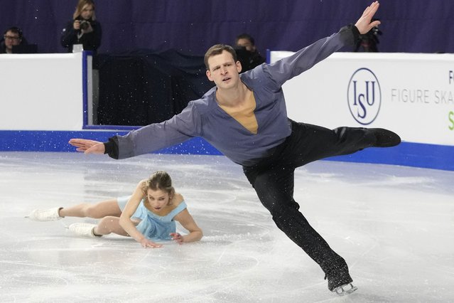 Alisa Efimova, left, falls beside Misha Mitrofanov of the United States as they perform during the pairs free skating at the ISU Four Continents Figure Skating Championships at the Mokdong ice rink in Seoul, South Korea, Friday, February 21, 2025. (Photo by Lee Jin-man/AP Photo)