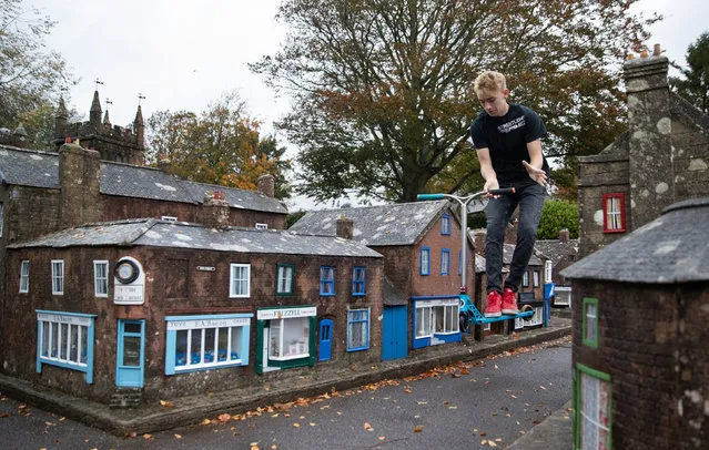 Charlie Sibley from the Wimborne's StreetLight Project scooters through the streets of Wimborne Model Town and Gardens in Wimborne, Dorset on October 23, 2020. (Photo by Andrew Matthews/PA Images via Getty Images)
