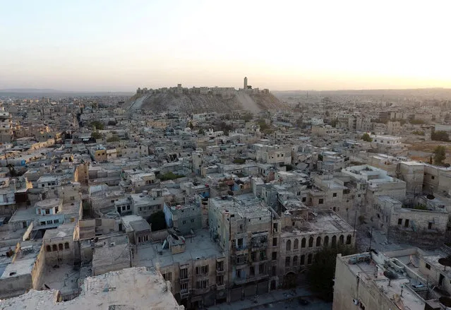 A general view taken with a drone shows Aleppo's historic citadel, controlled by forces loyal to Syria's President Bashar al-Assad, as seen from a rebel-held area of Aleppo, Syria, October 12, 2016. (Photo by Abdalrhman Ismail/Reuters)