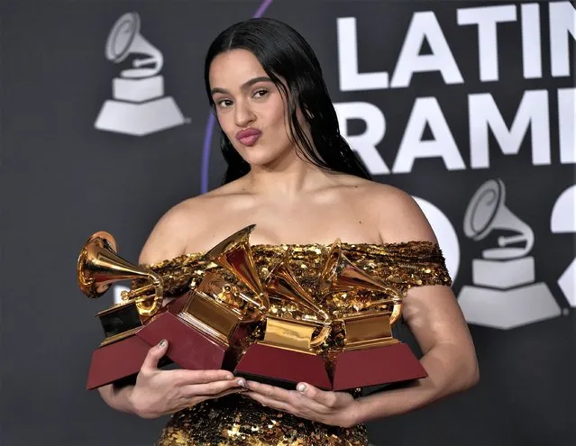 Spanish artist Rosalia poses in the press room with the awards for album of the year, best alternative music album and best recording package for “Motomami” at the 23rd annual Latin Grammy Awards at the Mandalay Bay Michelob Ultra Arena on Thursday, November 17, 2022, in Las Vegas. The next Latin Grammy Awards gala will be held in southern Spain, leaving the United States for the first time, the head of its organization said Wednesday, Feb. 22, 2023. (Photo by John Locher/AP Photo)