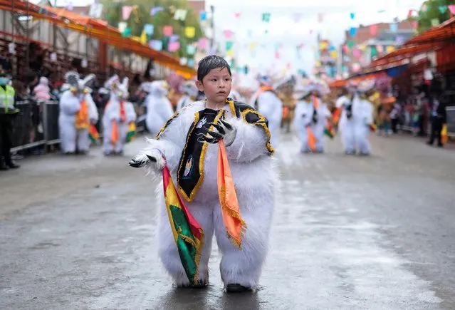 Kalep, 5, in a bear costume, participates in parade where his father Johnny Lopez was the Elder Angel, during the Oruro Carnival, a traditional celebration that can be traced back to the indigenous Ito festival, in Oruro, Bolivia February 26, 2022. (Photo by Wara Vargas/Reuters)