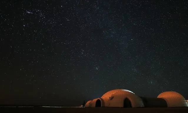 A picture taken on February 7, 2018 shows a simulation Mars habitat, with a view of the night sky above in Oman' s Dhofar desert, during an analog field simulation in a collaboration between the Austrian Space Forum and the Oman National Steering Comittee preparing for future human Mars missions. (Photo by Karim Sahib/AFP Photo)