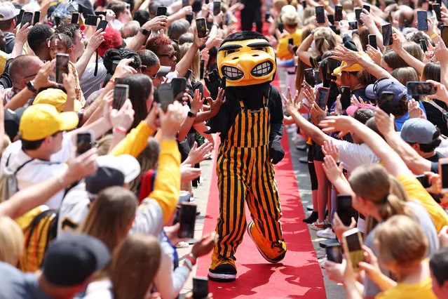 Head coach Kim Mulkey of the LSU Lady Tigers enters the stadium on the red carpet before playing against the Iowa Hawkeyes during the 2023 NCAA Women's Basketball Tournament championship game at American Airlines Center on April 02, 2023 in Dallas, Texas. (Photo by Maddie Meyer/Getty Images)