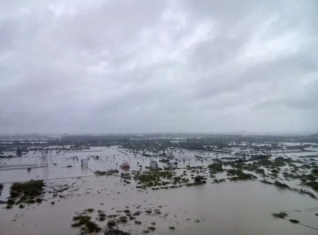 Flooded areas are pictured on the outskirts of Chennai, India, December 2, 2015. The heaviest rainfall in over a century has caused massive flooding across the southern Indian state of Tamil Nadu, driving thousands from their homes, shutting auto factories and paralysing the airport in the state capital Chennai. (Photo by Reuters/Stringer)