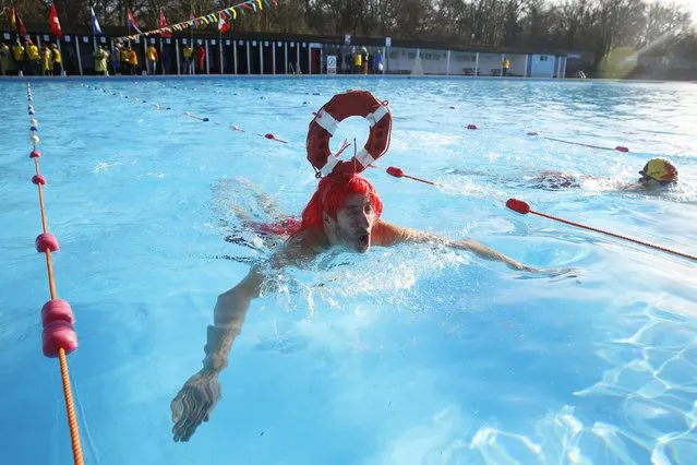 A swimmer competes in the UK Cold Water Swimming Championships at Tooting Bec Lido in south London January 24, 2015. (Photo by Luke MacGregor/Reuters)