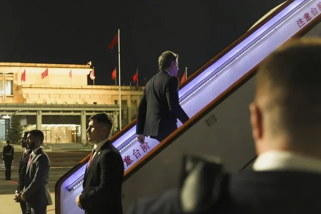 U.S. Secretary of State Antony Blinken boards his plane for travel to London from Beijing, Monday, June 19, 2023. (Photo by Leah Millis/Pool Photo via AP Photo)
