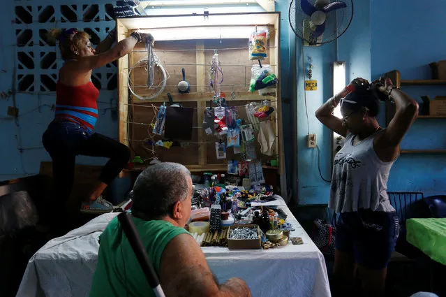People set up a stall where they offer different items for sale in Havana, Cuba, December 3, 2016. (Photo by Reuters/Stringer)