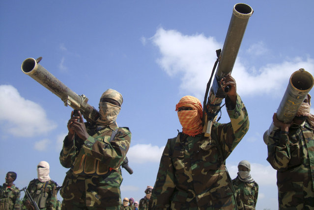 In 2008 the U.S. designated al Shabaab a foreign terrorist organization. Here: members of the hardline al Shabaab Islamist rebel group hold their weapons in Somalia's capital Mogadishu, January 1, 2010. (Photo by Feisal Omar/Reuters)