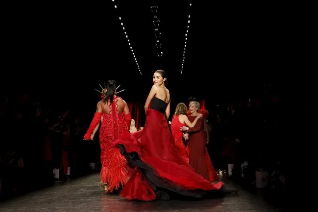 Olivia Culpo presents a creation during the American Heart Association's (AHA) Go Red For Women Red Dress Collection, presented by Macy's at New York Fashion Week February 11, 2016. (Photo by Andrew Kelly/Reuters)