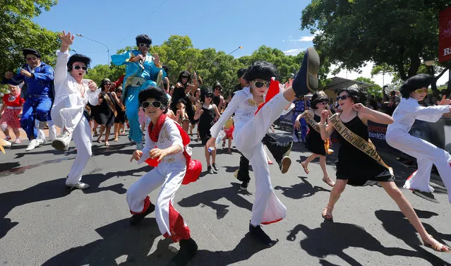 Children and adults dressed as Elvis Presley participate in a street parade at the 25th annual Parkes Elvis Festival in the rural Australian town of Parkes, west of Sydney, January 14, 2017. (Photo by Jason Reed/Reuters)