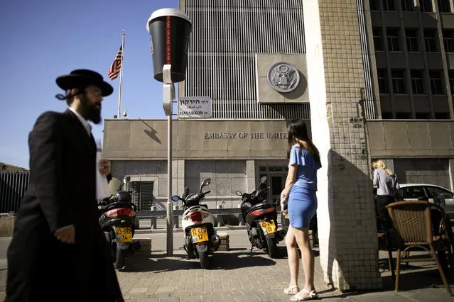 An ultra-Orthodox Jewish man walks by the U.S. embassy in Tel Aviv, Israel January 20, 2017. (Photo by Amir Cohen/Reuters)