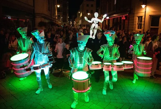 Sense of Unity light parade takes place on September 25, 2021 in Weymouth, United Kingdom. “Sense of Unity” is a performance by two theatre companies, Dundu from Germany and Worldbeaters from Whitley Bay, who have been touring the world since 2017 and provided the finale of Activate's Inside Out Dorset festival. (Photo by Finnbarr Webster/Getty Images)