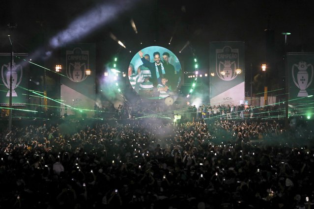 A video screen shows Sporting's head coach Ruben Amorim as the team celebrates with thousands of fans after winning the Portuguese soccer league, in Lisbon, Monday, May 6, 2024. Sporting clinched the title, with two rounds left to play, when cross-town rivals Benfica lost their match Sunday night. (Photo by Pedro Rocha/AP Photo)