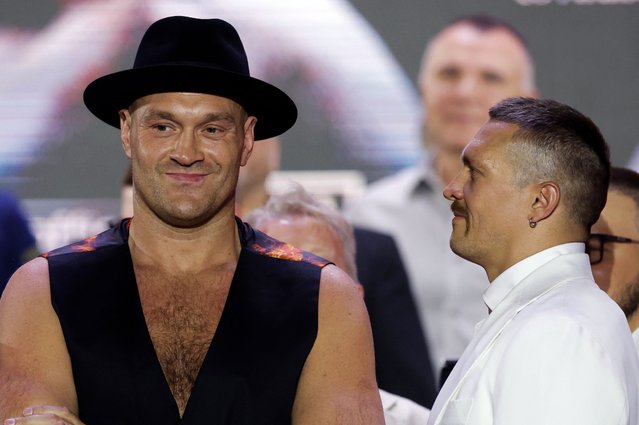 Tyson Fury (L) and Oleksandr Usyk during a press conference at BLVD City Music World, Riyadh on May 16, 2024. The IBF, WBA, WBC and WBO heavyweight title fight between Tyson Fury v Oleksandr Usyk will take place on Saturday 18th May. (Photo by Andrew Couldridge/Reuters)