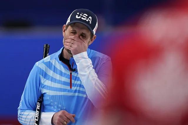 United States' John Shuster reacts after a bad throw during the men's curling bronze medal match between Canada and the United States at the Beijing Winter Olympics Friday, February 18, 2022, in Beijing. (Photo by Brynn Anderson/AP Photo)