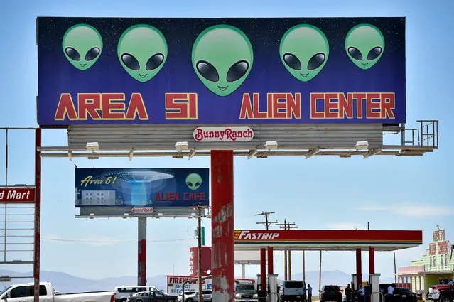 A billboard advertising for a convenience store named the Area 51 Alien Center is seen along U.S. highway 95 on July 21, 2019 in Amargosa Valley, Nevada. A Facebook event entitled, “Storm Area 51, They Can't Stop All of Us”, which the author meant as a joke, suggested the attendees to meet up at this colorful tourist attraction before storming the highly classified U.S. Air Force facility on September 20, 2019, to address a conspiracy theory that the U.S. government is conducting tests with space aliens. Area 51 has “secrets that deserve to be protected”, David Goldfein, a four-star general who serves as the Air Force Chief of Staff said after millions vowed to raid the highly classified base this weekend. (Photo by David Becker/Getty Images)