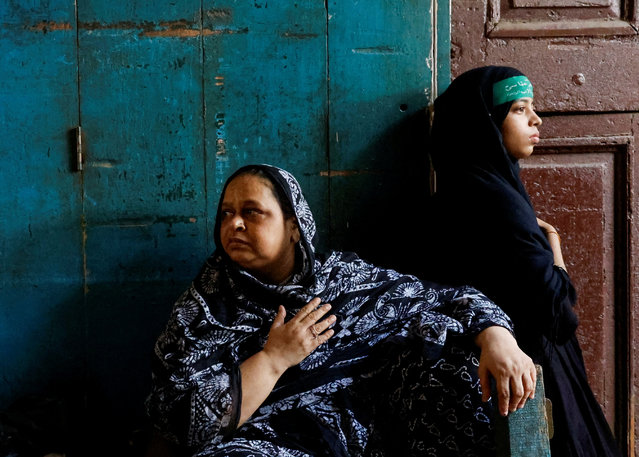 Shiite Muslim women mourn as they attend a Muharram procession marking Ashura in Kolkata, India on July 17, 2024. (Photo by Sahiba Chawdhary/Reuters)