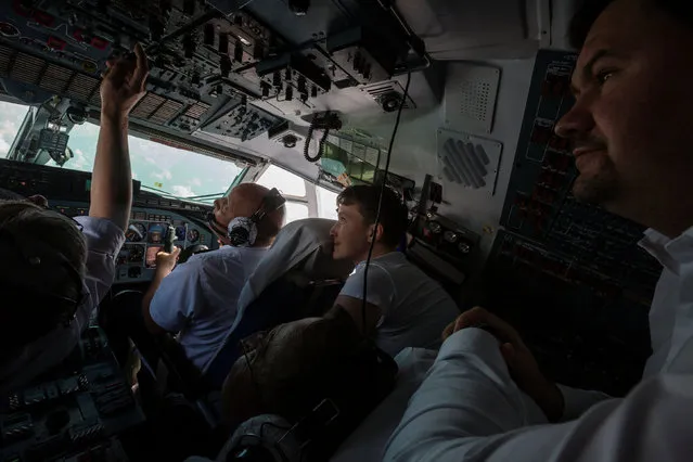 Ukrainian servicewoman Nadiya Savchenko is seen in the cockpit of a plane returning to Ukraine from Russia, May 25, 2016. (Photo by Mikhail Palinchak/Reuters/Courtesy of Ukrainian Presidential Press Service)