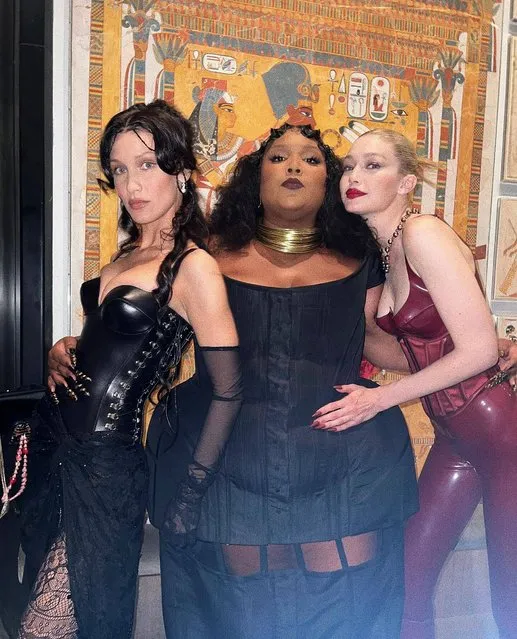 Lizzo, who wore the new Charlotte Tilbury Beautiful Skin Sun-Kissed Glow Bronzer, gets stuck in the middle of a Hadid “sister sandwich” on May 2, 2022. (Photo by lizzobeeating/Instagram)