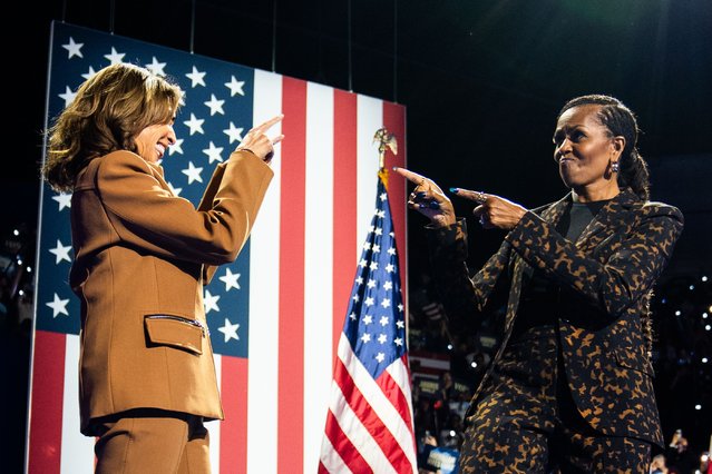 Democratic presidential candidate Vice President Kamala Harris and Former First Lady Michelle Obama during a campaign rally at Wings Event Center in Kalamazoo, MI, on October 26, 2024. (Photo by Demetrius Freeman/The Washington Post)