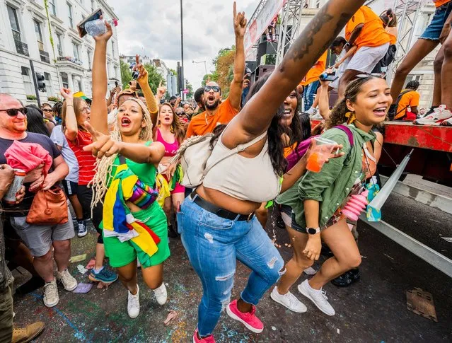 Large crowds enjoy the music on “Childrens” day – Notting Hill Carnival returns after the covid hiatus on August 28, 2022. It is normally an annual event on the streets of the Royal Borough of Kensington and Chelsea, over the August bank holiday weekend. (Photo by Guy Bell/Rex Features/Shutterstock)
