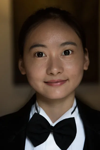 A butlery student stands for a portrait at The International Butler Academy China on September 16, 2014 in Chengdu, China. (Photo by Taylor Weidman/Getty Images)