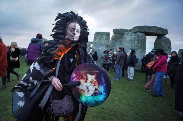 Winter Solstice celebrations at Stonehenge on December 22, 2023. Revellers including modern day druids and pagans gather at Stonehenge on Salisbury Plain to celebrate the first day of winter – the shortest day and longest night of the year. (Photo by Guy Corbishley/Alamy Live News)