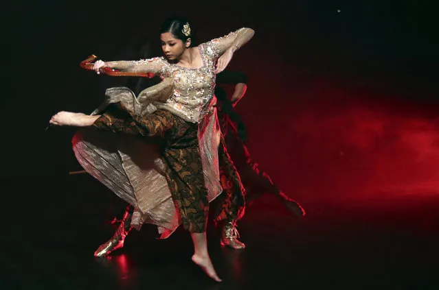 Indonesian dancer Nala Amyrtha performs during a video recording for “Saweran Online” program on Indonesia Dance Network YouTube channel, at EKI Dance Company studio in Jakarta, Indonesia Thursday, May 14, 2020. Two Indonesian choreographers are helping fellow dancers who lost their jobs due to the new coronavirus outbreak in the country by setting up aYouTube channel as a platform where dancers, choreographers and dance teachers can perform, then receive donation from viewers. (Photo by Achmad Ibrahim/AP Photo)