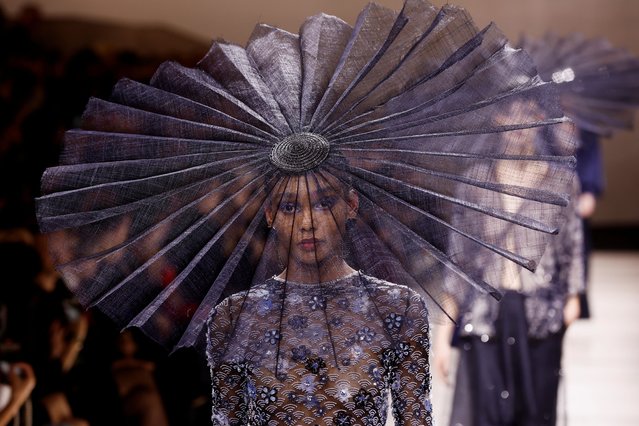 A model presents a creation by designer Giorgio Armani as part of his Haute Couture Spring-Summer 2024 collection show for Giorgio Armani Prive in Paris, France, on January 23, 2024. (Photo by Benoit Tessier/Reuters)