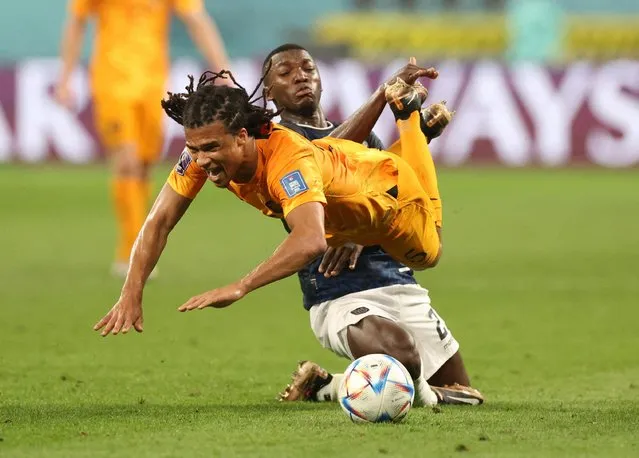 Moises Caicedo of Ecuador and Nathan Ake of Holland during the FIFA World Cup Qatar 2022 group A match between the Netherlands and Ecuador at the Khalifa International Stadium on November 25, 2022 in Al-Rayyan, Qatar. (Photo by Carl Recine/Reuters)