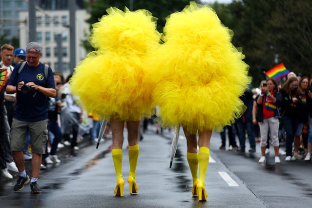 Members of the LGBTQI+ community walk on the day of the annual Christopher Street Day Pride parade (CSD), in Cologne, Germany on July 6, 2025. (Photo by Thilo Schmuelgen/Reuters)