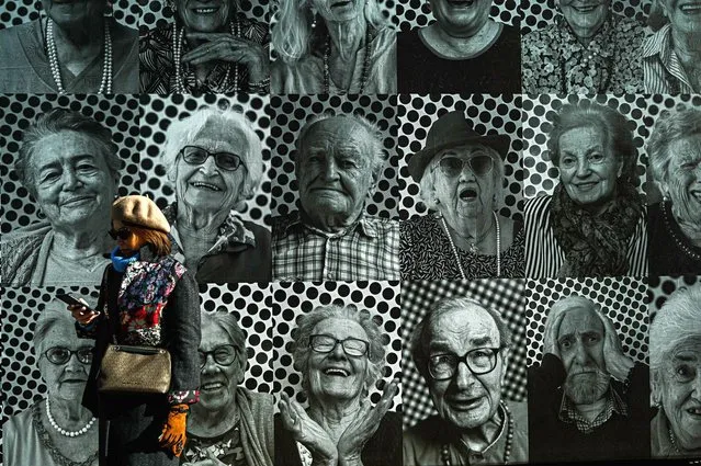 A general view of the installation entitled âOra tocca a voiâ by participatory art project Inside Out by French artist JR in Piazza Duomo in Milan, Italy on January 30, 2023. The installation depicts the faces of elderly guests in 40 Italian retirement homes, created in the second half of 2022 by students of the Brera Academy. (Photo by Piero Cruciatti/Anadolu Agency via Getty Images)